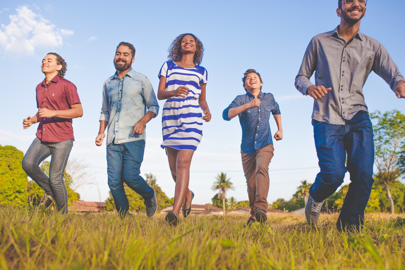 Group of people walking outdoors for fitness and health