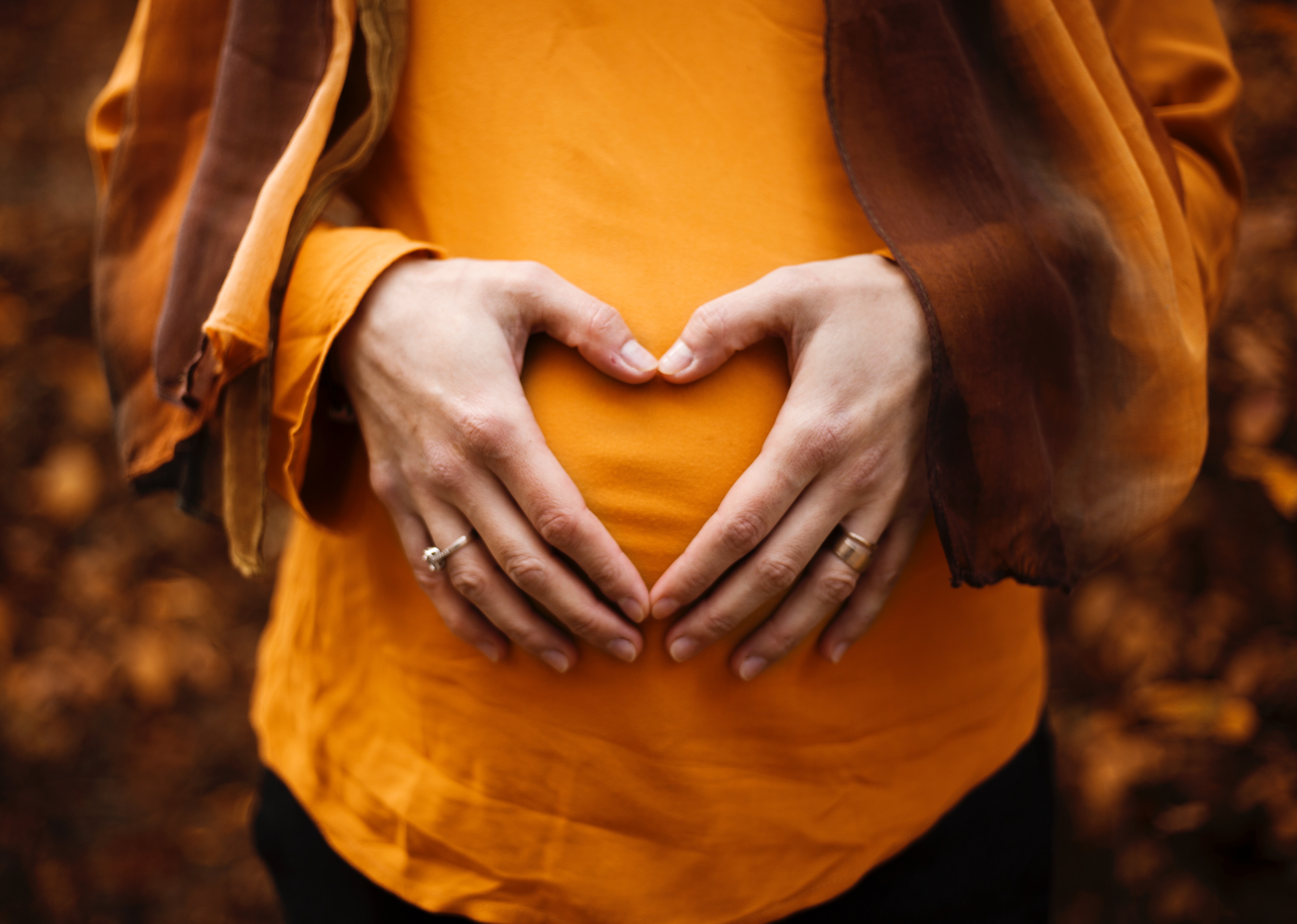 Pregnant woman experiencing comfort with chiropractic pregnancy pain relief