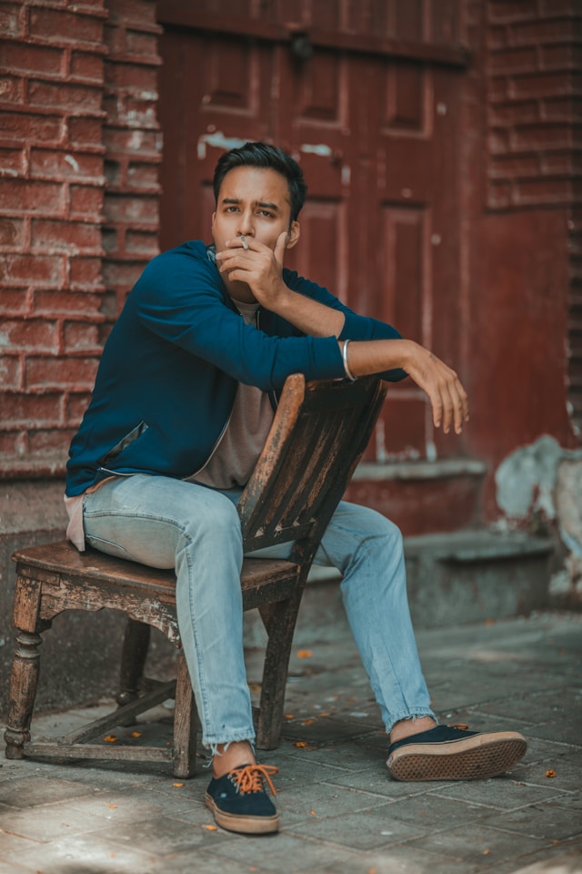 Person sitting for extended periods, illustrating the health risks of sedentary behavior