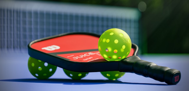 Pickleball player on court, representing active lifestyle and injury prevention